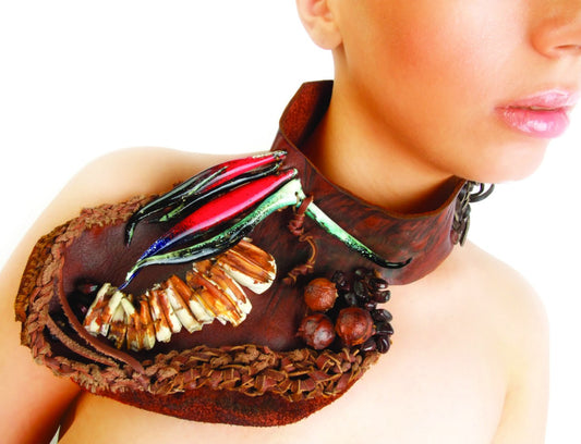 bisexual Jewelry / enamel on copper, sheep's teeth,  leader and plant seeds / 30*15 cm / 2022